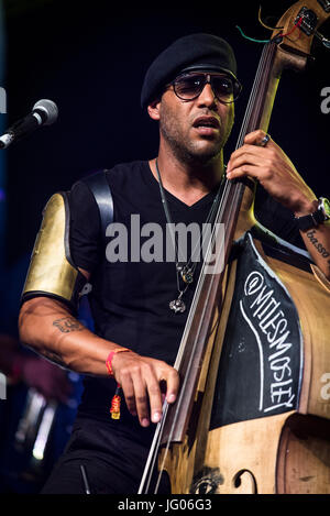 Glynde, England, Uk. 02nd July, 2017. Glynde, East Sussex, 2nd July, 2017. Miles Mosley the West Coast Get Down perform live on the Arena Stage at Love Supreme Jazz Festival at Glynde Place. Credit: Francesca Moore/Alamy Live News Stock Photo