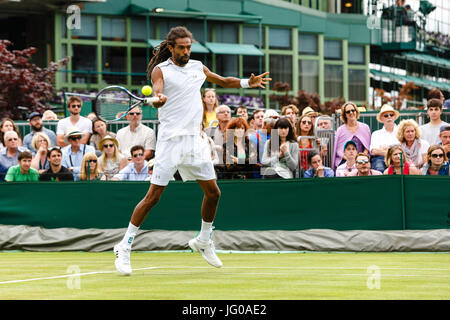 London, UK. 3rd July, 2017. German tennis player Dustin Brown in action during his 1st round match at the Wimbledon Tennis Championships 2017 at the All England Lawn Tennis and Croquet Club in London. Credit: Frank Molter/Alamy Live News Stock Photo
