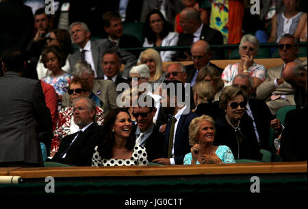 London, UK. 03rd July, 2017. 3 July, 2017 - Wimbledon: The Duchess of Cambridge, Kate Middleton enjoys a laugh in the Royal Box on Centre Court at Wimbledon, while waiting out a rain delay during Andy Murray's first round match today. Credit: Adam Stoltman/Alamy Live News Stock Photo