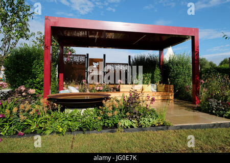 Hampton Court, England, UK. 3rd July, 2017. 'A Place to Meet' show garden designed by The Association of Professional Landscapers, The RHS Hampton Court Palace Flower Show. Credit: P Tomlins/Alamy Live News Stock Photo