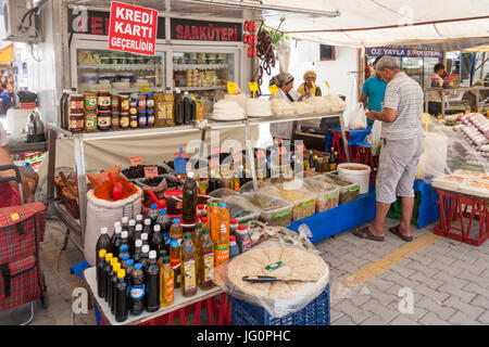 Shop selling olives and other provisions on a market in Alanya, Turkey Stock Photo