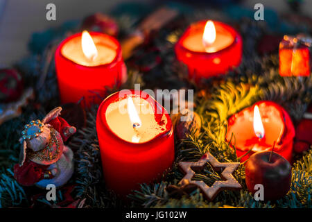Advent wreath with lit red candles from above Stock Photo