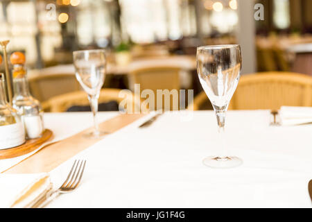 Empty glasses set in restaurant Stock Photo