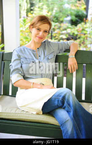Celebrity Mexican American TV chef Pati Jinich author of cookbooks and Show on PBS Pati's Mexican Table - at home - Stock Photo