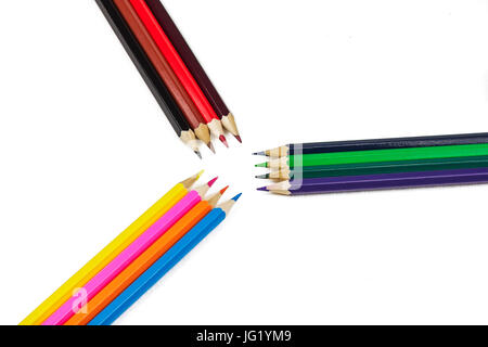 On a white background different color sharpened pencils for drawing lie Stock Photo