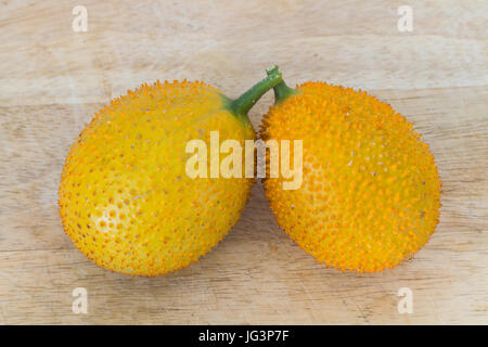 Gac Fruit Or Baby Jackfruit On Wooden Background. Stock Photo