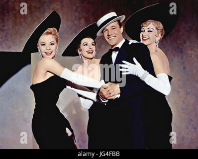 LES GIRLS 1957 MGM film musical with from left: Mitzi Gaynor, Kay Kendall, Gene Kelly, Taina Elg Stock Photo