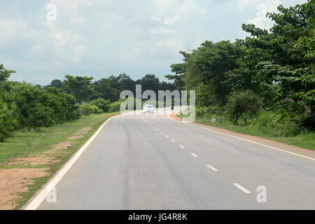 Kolkata, India. 29th June, 2017. Road traffic moves along NH16 in West Bengal and Odisha border which connect Kolkata and Chennai via Odisha and Andhra Pradesh and also the of the Golden Triangle Quadrilateral project. Credit: Saikat Paul/Pacific Press/Alamy Live News Stock Photo