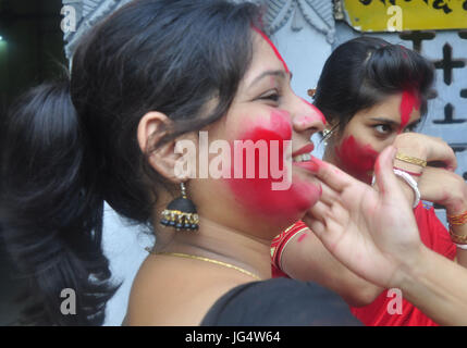 Abhisek Saha / Le Pictorium -  Kharchi Puja festival in India -  22/06/2017  -  India / Tripura / Agartala  -  Women are drawing swastik (Holy Sign) in the temple  and giving vermilion with wish of a happy married life  on the occeasion of Ambubachi , in a temple of Agartala, capital of the northeastern state of Tripura.                                                              Ambubachi is the celebration of the menstruation  of mother earth.The belive is, During Ambubachi , for three days mother earth herself menstruates.Pix By-Abhisek Saha Stock Photo