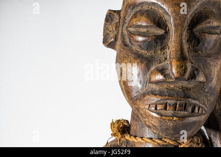 African wooden doll, handmade isolated on white background. Stock Photo