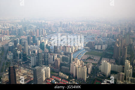 View from Shanghai World Financial Center Observatory of air pollution over south eastern suburbs of Pudong, Shanghai, China Stock Photo