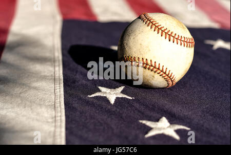 A baseball on a vintage Betsy Ross American flag Stock Photo