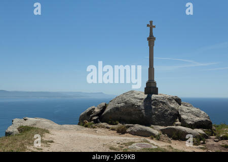 Traditional Galician calvary (crucero) on the coast of the Atlantic Ocean on Cape Finisterre (Cabo Fisterra) in Galicia, Spain. Stock Photo