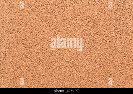 Terracotta painted stucco wall. Background texture. Stock Photo