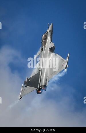 A French Dassault Rafale fighter aircraft performs aerial maneuvers during the Paris Air Show at the Paris-Le Bourget Airport June 23, 2017 in Le Bourget, France.  (photo by Ryan Crane via Planetpix) Stock Photo