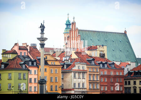 Zygmunt Column monument and charming tenements in the city center of Warsaw, Poland Stock Photo