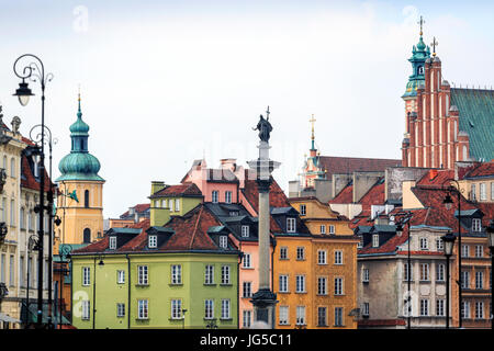 Zygmunt Column monument and charming tenements in the city center of Warsaw, Poland Stock Photo