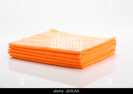 Orange cleaning clothes isolated on white background Stock Photo
