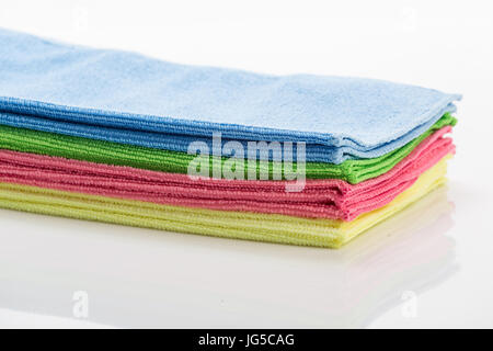 Cleaning clothes in different colors on stack Stock Photo