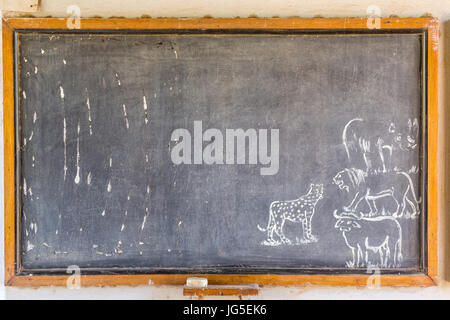 African blackboard with drawings of safari animals Stock Photo