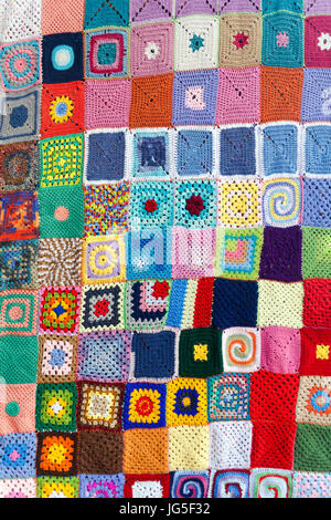 Colored knitted carpet textile background Stock Photo