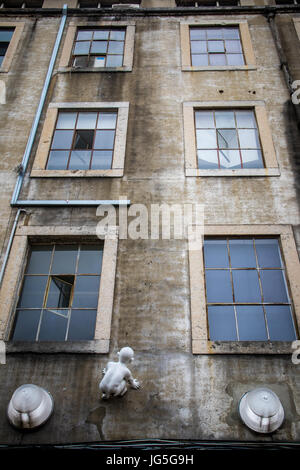 LISBON, PORTUGAL - June 2017 - Windows of old industrial building in LX Factory Stock Photo