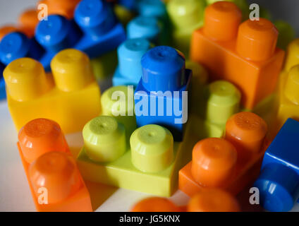 Multi coloured plastic toy building blocks Stock Photo