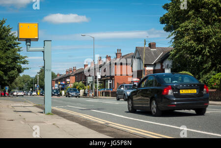 Cars driving passed a speed camera in Bury, Lancashire. Stock Photo
