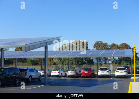 HOUSTON, USA - JANUARY 12, 2017: Some cars parked, with some solar panel protecting from the sun in Legoland park, Legoland is a theme park based on t Stock Photo