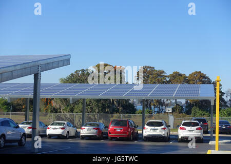 HOUSTON, USA - JANUARY 12, 2017: Some cars parked, with some solar panel protecting from the sun in Legoland park, Legoland is a theme park based on t Stock Photo