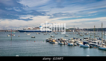 France, Brittany, Dinard, Port de Plaisance de Dinard, moorings of the Yacht Club Dinard on the River Rance in the Baie du Prieuré with a view of crui Stock Photo