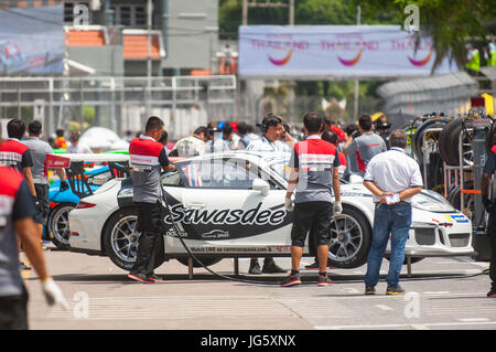 Bang Saen, Thailand - July 1, 2017: The Porsche GT3 Cup of Sontaya Kunplome from Thailand being serviced in the pit lane during Porsche Carrera Cup As Stock Photo