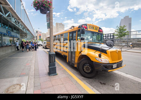 Toronto, Canada - 26 June 2017: Yellow school bus parked in Toronto Downtown Stock Photo