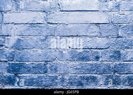 brick  wall  with blue, silver colored paint Stock Photo