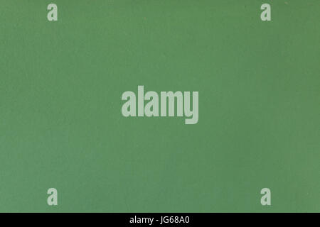 Green painted stucco wall. Background texture. Stock Photo