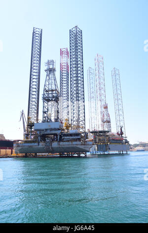 Ocean going Oil Drilling Rig moored in Harbor, Valletta Malta Stock Photo