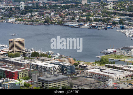 View on Lake Union from the Space Needle in Seattle, Washington with a seaplane landing on the water Stock Photo