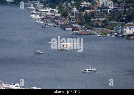 Seaplane is taking off from Lake Union in Seattle, Washington Stock Photo