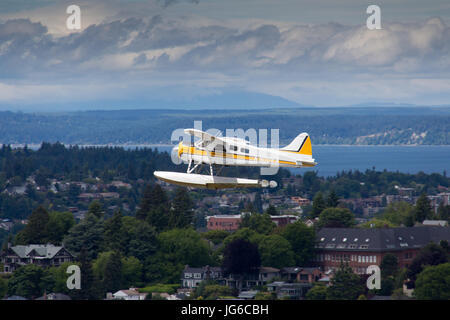 Seaplane from Kenmore Air during a scenic flight in Seattle, as seen from the Space Needle in Seattle, Washington Stock Photo