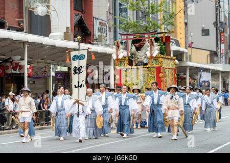 Men in traditional clothing. Kyoto, Gion Matsuri Festival processions of floats god. One of the most famous festival in Japan. Stock Photo