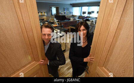 ARCHIVE - Nicole Ebner, head of the VIP services and protocol, as well as manager Sebastian Thurau open the door to the luxurious VIP Lounge of the airport, which offers a calm, exclusive environment without screaming children and stressful common people in Frankfurt am Main, Germany, 29 May 2017. Comfortable lounge seats, a glass of champagne, a wide array of newspapers - these are the things that money can buy. Half a year ago the new VIP lounge was opened in the secured area of the airport. Photo: Arne Dedert/dpa Stock Photo