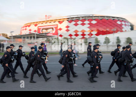 Moscow, Russia. 21st June, 2017. Policemen walk in front of the Otkrytiya Arena after the Confederations Cup match between Russia and Portugal in Moscow, Russia, 21 June 2017. Photo: Marius Becker/dpa/Alamy Live News Stock Photo