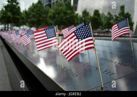 New York City, USA. 3rd Jul, 2017. Flags placed at the 9/11 Memorial in celebration of the Fourth of July in New York City. Credit: Christopher Penler/Alamy Live News Stock Photo