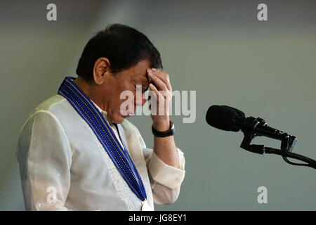 Pampanga Province, Philippines. 4th July, 2017. Philippines President Rodrigo Duterte reacts during the 70th anniversary of the Philippine Air Force (PAF) at Clark Air Base in Pampanga Province, the Philippines, July 4, 2017. Credit: Rouelle Umali/Xinhua/Alamy Live News Stock Photo