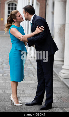 Dublin, Ireland. 4trh Jul, 2017. Sophie Gregoire Trudeau, wife of Canadian Prime Minister Justin Trudeau, is greeted by An Taoiseach (Prime Minister) Leo Varadkar TD as they arrive at Dublin Castle for the Official Dinner. The Prime Minister of Canada Justin Trudeau is on an official visit to Ireland. Credit: RollingNews.ie/Alamy Live News