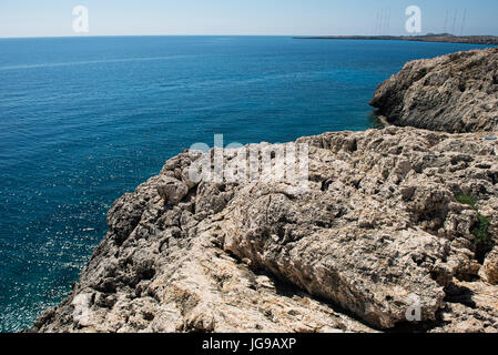 Rocky coastline in Paralimni, Cape Greco, Cyprus island Stock Photo