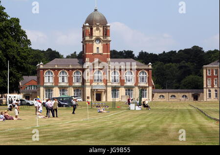Sandhurst, Surrey, UK - June 18th 2017: Visitors to the Royal Military Academy Sandhurst waiting for the polo to start, in front of the New College Cl Stock Photo