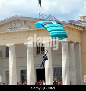 Sandhurst, Surrey, UK - June 18th 2017: Parachutist of the RLC Silver Stars Parachute Display Team coming in to land on the Parade Ground in front of  Stock Photo