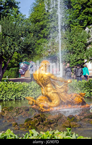 Peterhof Palace Triton Fountain in Orangie Garden depicts a triton grappling the jaws of a sea monster near St Petersburg Russia Stock Photo
