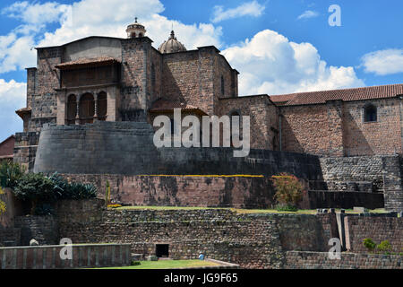 The Santo Domingo Catholic Church and Convent sits atop a hill and is built on Incan ruins of the Coricancha temple. Stock Photo